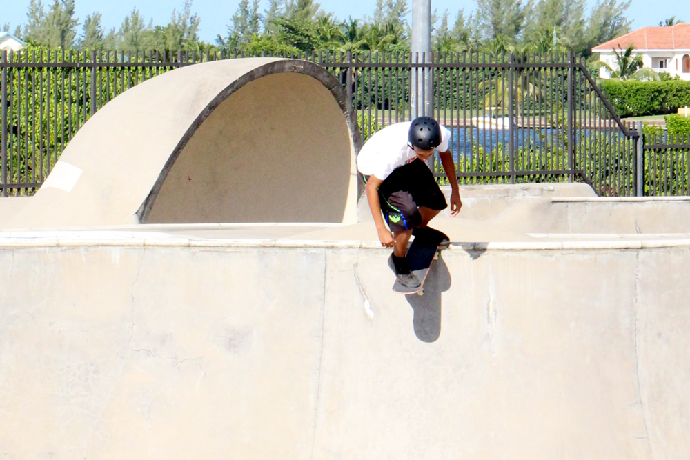 Living on the edge. Ethan Hydes, 15, prepares for a stunt at the skate park Thursday.