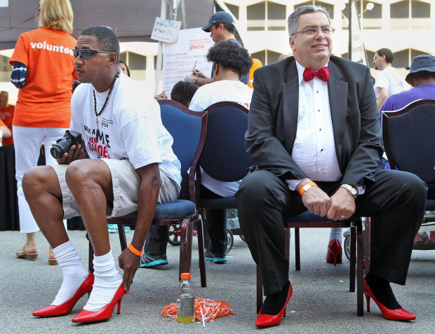 Participants gear up for "Walk a mile in HER shoes" elsewhere in the world.