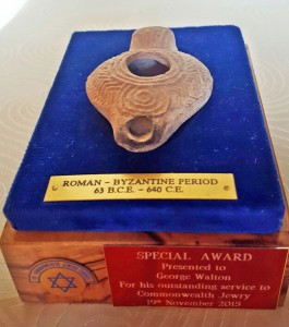 The ancient clay lamp presented to George Walton for his contributions to the Jewish faith.