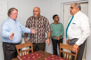From left, Deputy Premier Moses Kirkconnell, District Commissioner Ernie Scott, Acting Director of DCFS Paulinda Mendoza-Williams and Minister for Community Affairs Osbourne Bodden tour the new facility.