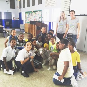 Kiara Jeggo and Kiralee Harnett, standing, pose with students.