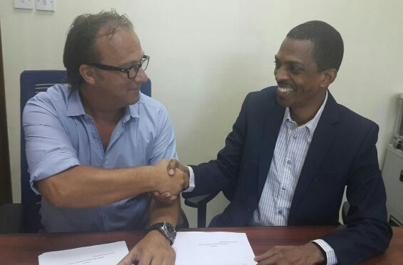 Gert Post of GTT and Ian Neita, CEO of Global Directories, which has expanded into Guyana.