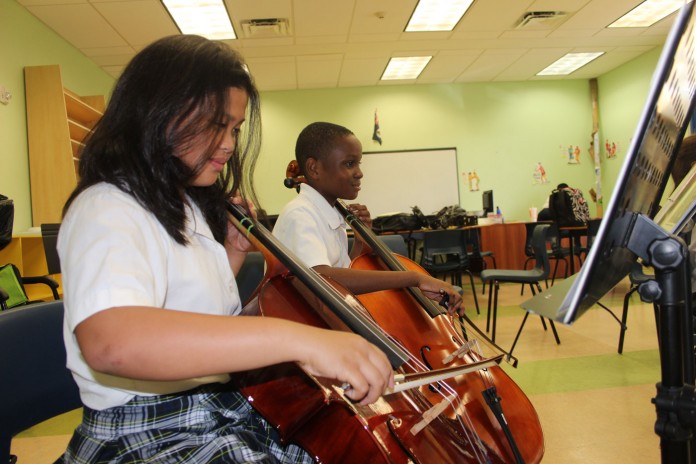 Kayla-David-plays-the-cello-alongside-Caleb-Feare-(Read-Only)