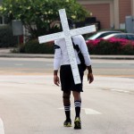 Carrying the cross from West Bay to East End