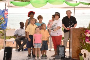 Little Cayman students sing the National Song and National Anthem at the opening of the agriculture show.