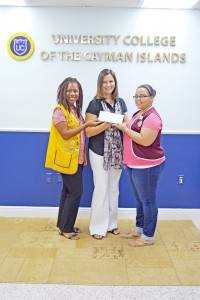 From left, Lions Club of Tropical Gardens' Belinda Blessitt-Vincent with Ania Milanowska, executive director of the Cayman Islands Crisis Centre, and Schizandra Porter, Omega Leo president.