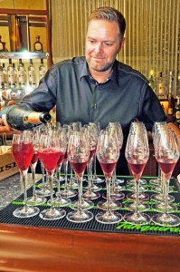 Bartender Micah Jensen mixes up a welcome drink at the cocktail dinner held at Cracked Conch restauraunt to mark the end of the first wave of the 2016 World Class competition in Cayman.