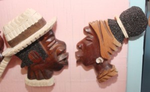 A number of wood carvings are on display in the store.