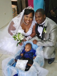 Mr. and Mrs. Hunt on their wedding day with son Oshane Jr.