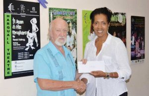 Martin Keeley, author of 'Marvelous Mangroves,' with Cayman National Cultural Foundation's Marcia Muttoo.
