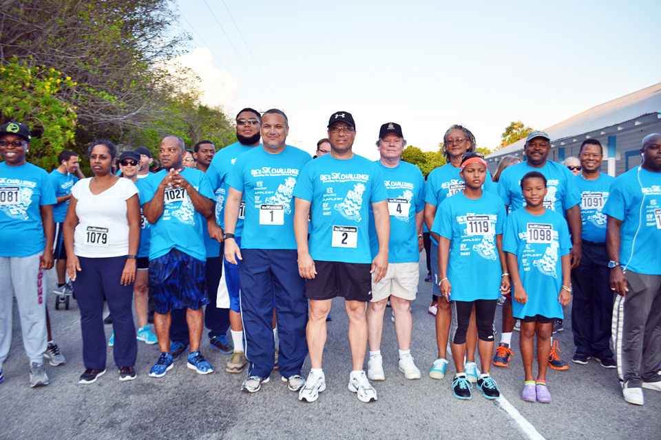 Brac DG 5K starting line with Franz Manderson, Premier Alden McLaughlin and Minister Moses Kirkconnell. - PHOTO: CHARLES GILMAN