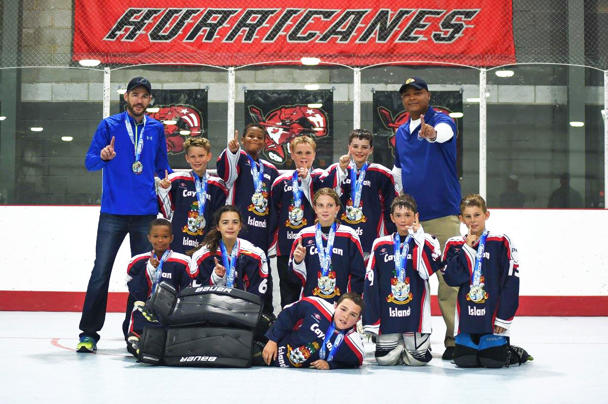 The Cayman Roller Hockey 10u team, with coaches Dennis Passchier, left, and Pat Cover, right came back from The victorious Cayman Roller Hockey 8u team, with coaches Pat Cover, left, and Dennis Passchier, right. North Carolina with a gold medal.