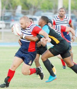 Andre Ormond powers through the Bahamas defense.
