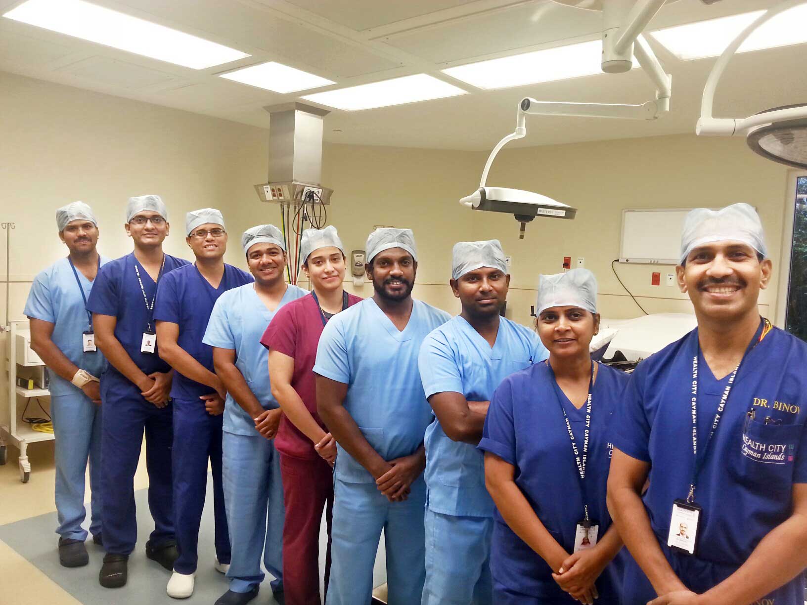 The Health City Cayman Islands surgical team that assisted Dr. Chattuparambil with John Miller III's life-saving heart surgery.