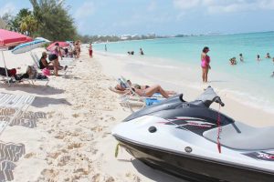 Condo owners on Seven Mile Beach say deckchairs hired to tourists are an eyesore.