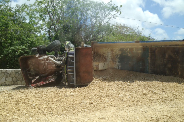 A dump truck spilled a load of marl all over Shamrock Road near Prospect Reef Wednesday.