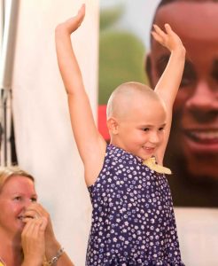 Seven-year-old Olly Thorpe shaved her head last year to honor her friend Hannah Meeson. – PHOTOS: JULIE CORSETTI