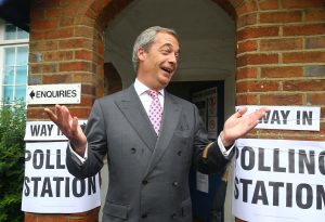 United Kingdom Independence Party leader, Nigel Farage, gestures as he arrives to cast his vote in Biggin Hill, south eastern England during Thursday's EU referendum. - Photo: AP