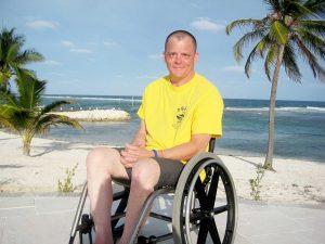 Charles Davis, who has been in a wheelchair since being involved in a motorcycle accident at the age of 21, describes diving for the first time in Cayman Brac as a 'life-changing event.'