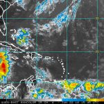 Tropical wave passing to the south