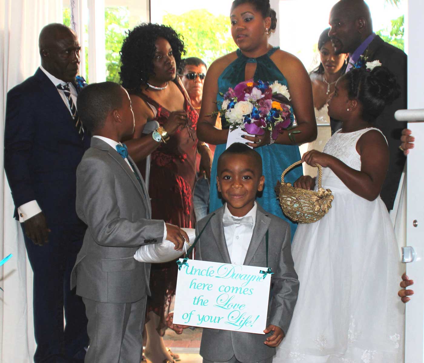 Adorable Zayden Abrahams was the official sign bearer.
