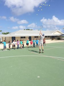 Tennis lessons for Brac youngsters are led by Noel Watkins.