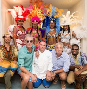 Reba Dilbert’s costumes featured at the Cayman Cookout in 2015, seen modeled here with celebrity chefs. – PHOTO: STEPHEN CLARKE