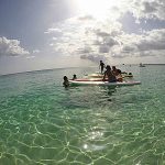 Paddleboarders aim to make a splash for Cayman charities