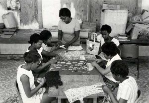 Students take part in a handicrafts class at the Cayman Islands High School in 1973. A high school reunion for all classes is being organized. - PHOTO: UK NATIONAL ARCHIVES