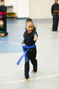 Arianna Watler, 6, competes in advanced forms division.