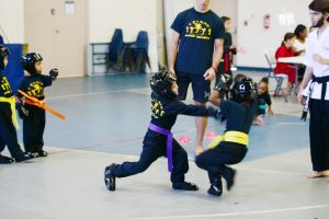 Alex Bush, 5, scores a punch.