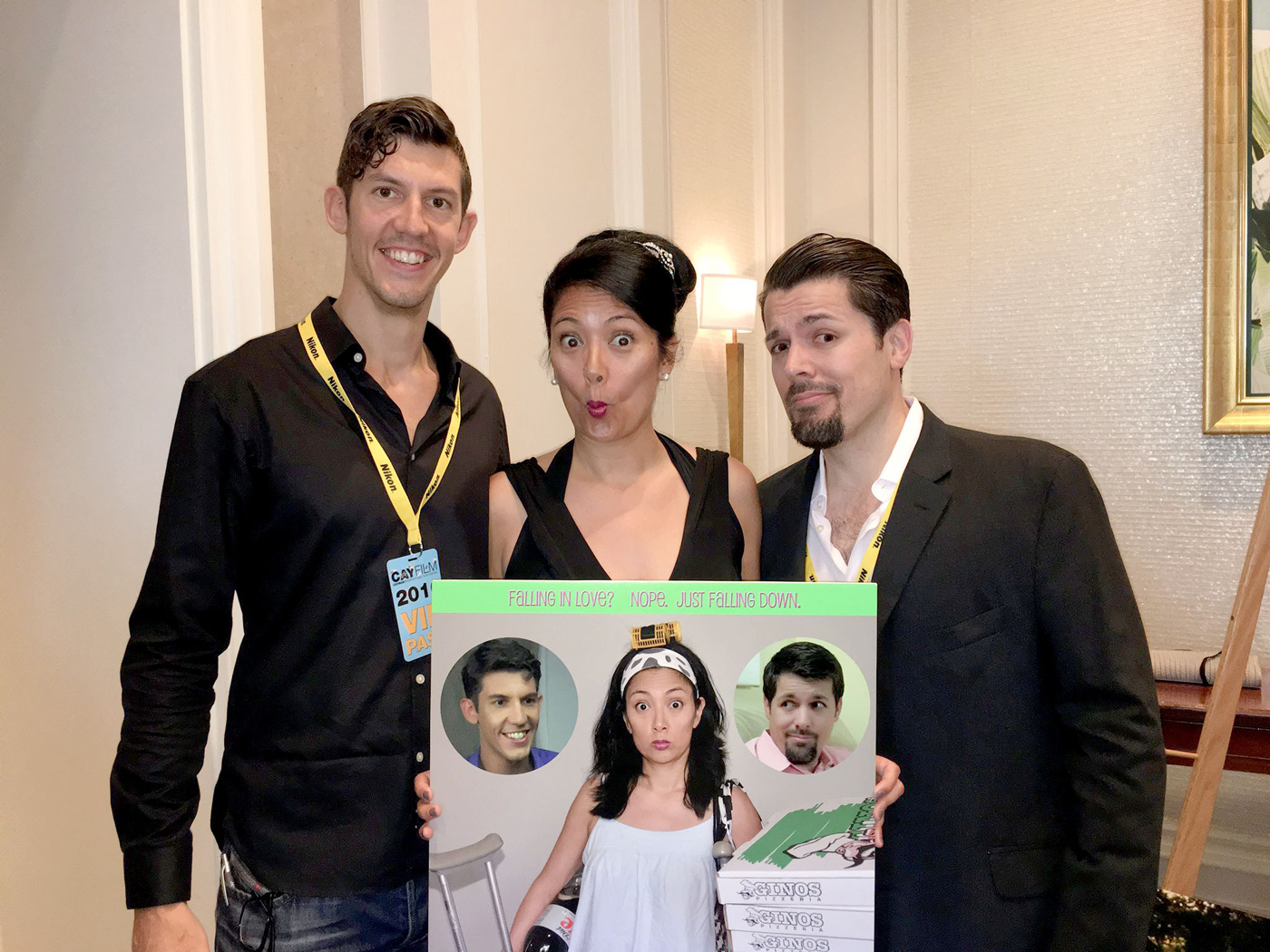 From left, Adam Cockerill, Michelle Morgan and Dominic Wheaton pose with the poster for the feature length film 'Tripping Through.'
