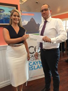 STEP Cayman Chairman Alan Milgate presents Philippa Stokes with her DART-sponsored award.