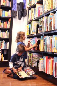  Children read at Books & Books in Camana Bay. 