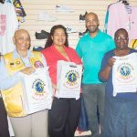 Lions buy school shoes for students