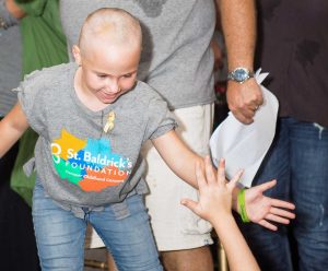 Seven-year old Olly Thorpe, Hannah Meeson’s friend, had her head shaved at the event. - PHOTO: TANEOS RAMSAY