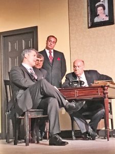 From left, Dominic Wheaton as Sir Humphrey Appleby holds forth, while Frank Wiesel (Michael McLaughlin), Bernard Wooley (Mike Bishop), and Jim Hacker (Adam Roberts) digest his advice.