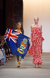 Georgette Bodden holds the Cayman flag during her finale walk on the Nolcha Show New York Fashion Week Spring/Summer 2017 ‘Ones To Watch’ runway show.