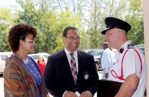 Fire Chief David Hails chats with Premier Alden McLaughlin and Education Minister Tara Rivers. - PHOTO: JEWEL LEVY