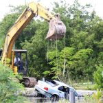 Woman dies as car plunges into canal