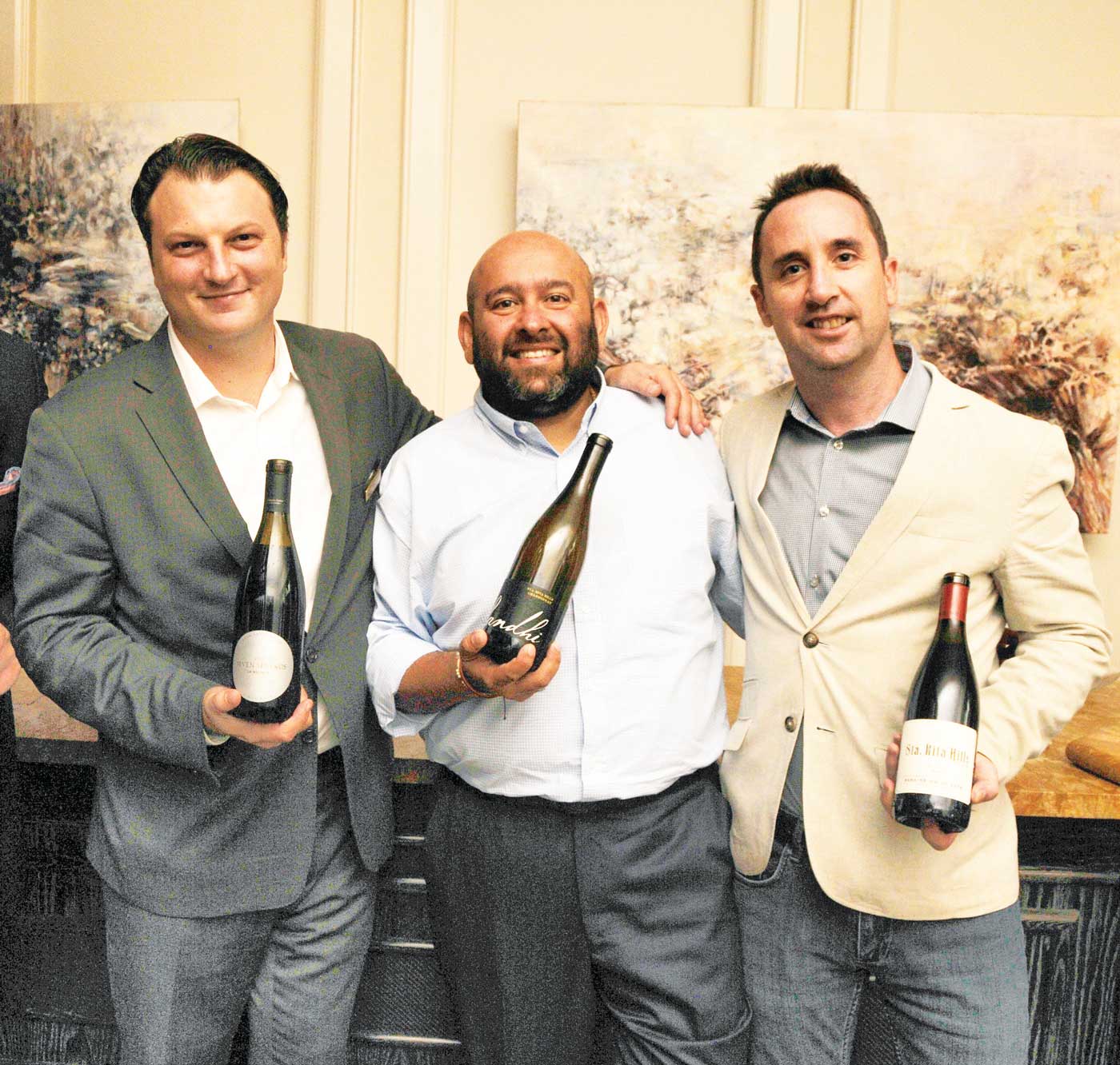 Winery owner and winemaker Rajet Parr, center, pictured here with The Ritz-Carlton, Grand Cayman's head sommelier William Lyon, left, and Cayman Distributors Wine Professional Lee Quessy, believes biodynamic farming definitely makes an impact on the quality of his Evening Land wines. - Photos: Alan Markoff