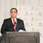 Cayman booming, but immigration issues unresolved, premier says