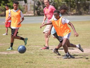 Simba Gurure plays in an alum vs. parents game on Saturday as part of the anniversary events. - Photos: matt Lamers 