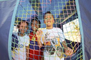 Peyton Pinedo, 6, Seth Ebanks, 7, and Elias McCoy, 6
