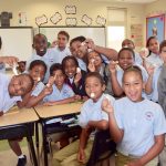 Bodden Town Primary students make candies the old fashioned way