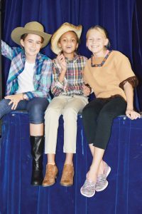 Chorus members. From left, Yasmin Fallon, Skye Phillips, Lily Frick.