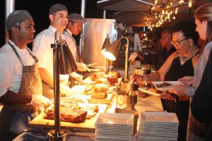 Guest sample food on the Marriott verandah. - Photo: Jewel Levy