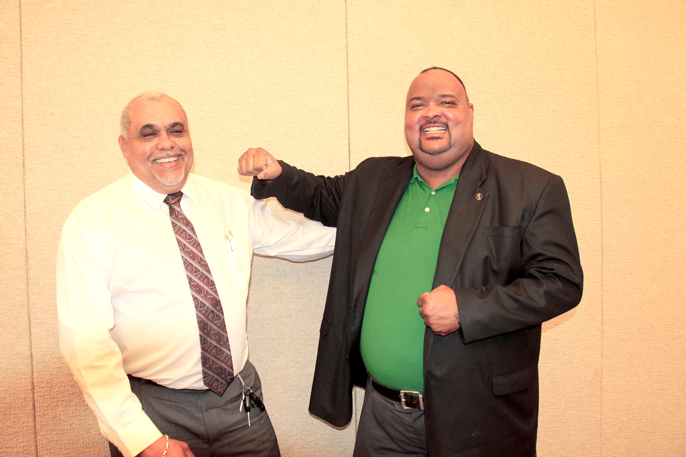 Sports Minister Osbourne Bodden and event promotor Matthew Leslie spar as they announce Manny Pacquiao’s upcoming visit. - PHOTO: JAMES WHITTAKER