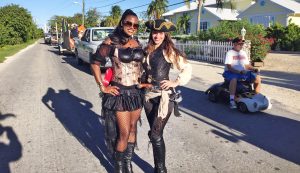 Pirates Week Executive Director Melanie Mcfield and Bloody Bay Buccaneer member Hannah Reid.