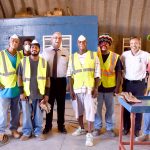 Seasonal workers clean up landfill